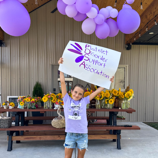 PDSA ITP Girl Holding PDSA Sign